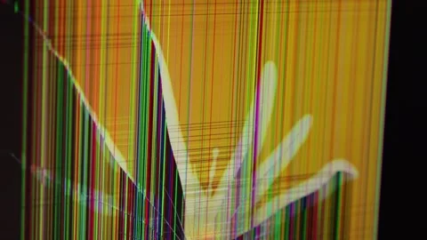 Broken LCD screen with shattered glass displays a colorful glitch pattern o.. Stock Footage 324964507