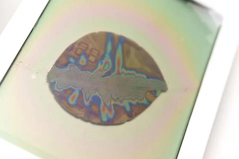 Broken LCD screen showing damage and colorful surface effects Stock Photos