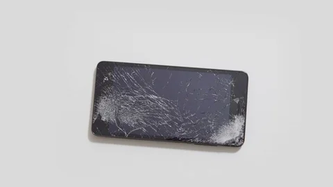 Broken LCD screen of the smartphone, faulty smartphone Stock Footage 70932782