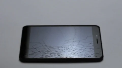 Broken LCD screen of the smartphone, faulty smartphone. arrival at the facility Video stock 98317316