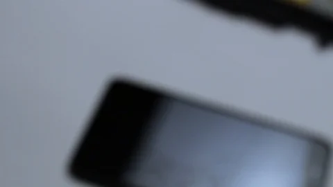 Broken LCD screen of the smartphone, faulty smartphone. arrival at the facility Stock Footage 98317403