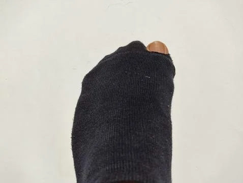 Broken left side sock Stock Photos