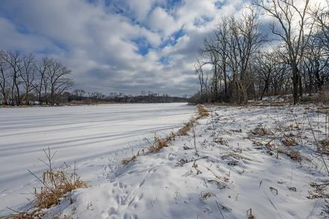 Broken Light and Clouds in a Winter Landscape Stock Photos