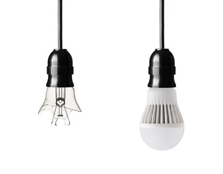 Broken light bulb and led bulb isolated on white Stock Photos