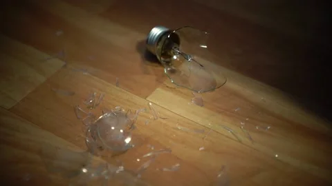 Broken Light Bulb on The Floor, Broken Bulb Glass Closeup, Destruction 스톡 동영상 233837640