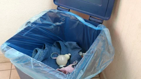 Broken Light Bulb Is Thrown Into A Mixed Waste house Bin 4k Stock Footage 253194855