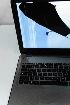 Broken liquid crystals on the laptop screen 스톡 사진