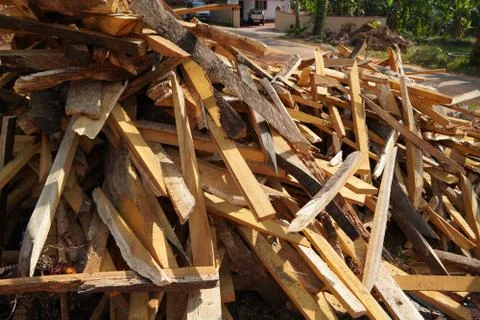 Broken long chunks of tree trunk. Close up broken pieces of wood. Pine timber Stock Photos
