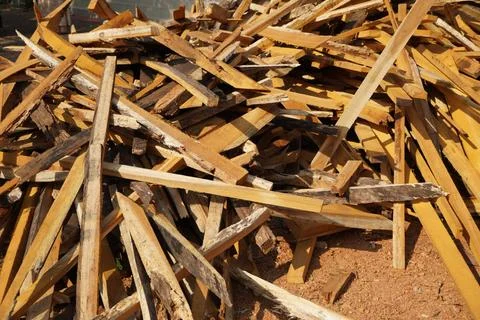 Broken long chunks of tree trunk. Close up broken pieces of wood. Pine timber Stock Photos