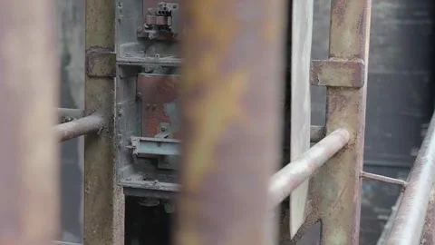 Broken machines in an old abandoned rusty factory, slow motion Stock Footage 305513483