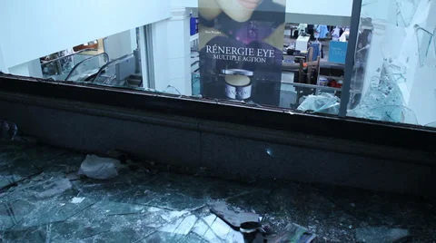 Broken mall window pan to left - HD 1080p Video stock 38920093