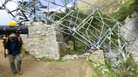Broken metal structure partially blocking the path Stock Footage 77449773