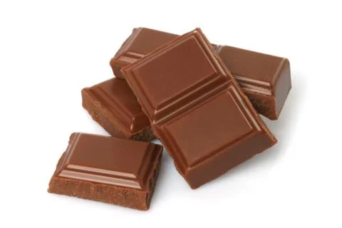 Broken milk chocolate bar . Stock Photos