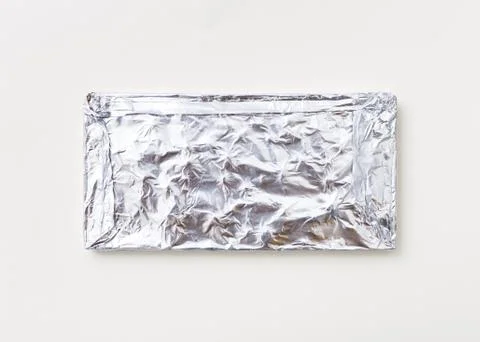Broken milk chocolate pattern, top view flat lay on background Stock Photos