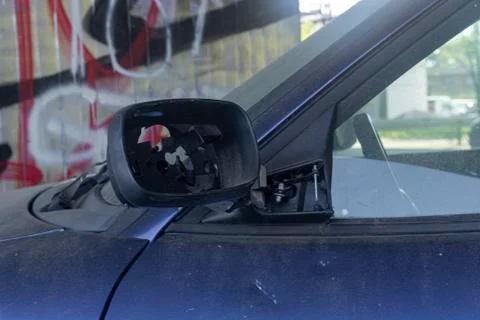 Broken mirror on a car close up Stock Photos