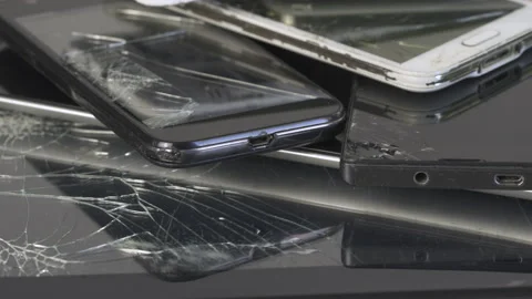 Broken Mobile Smart Phone and pad with crashed Screen Glass Lcd.  gadgets lyi Stock Footage 146522052