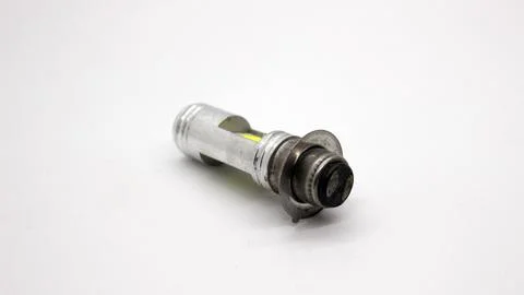 Broken motorcycle light bulb Stock Photos
