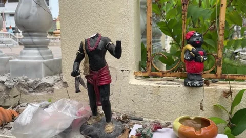 Broken no head figure model decorated near fence outdoor at temple. Thailand Stock Footage 252160950
