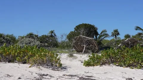 Broken Old Beach Umbrella on Empty Tropical Shore Stock Footage 305957777
