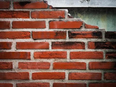 A broken old brick wall for background Stock-Fotos