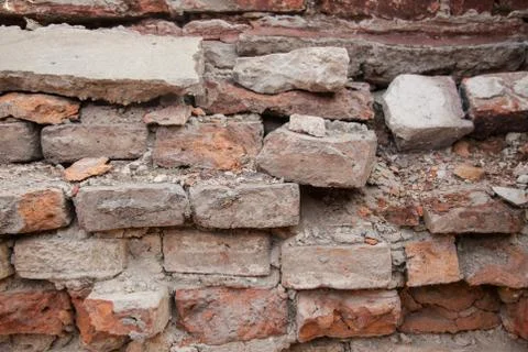 Broken old brick wall Stockfoto's