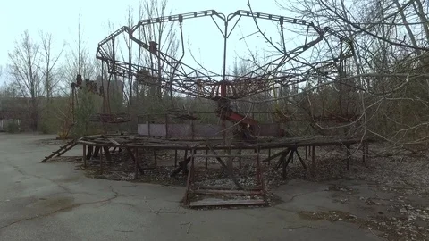 Broken old carousel in the city of Pripyat Stock Footage 74687997