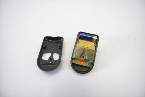 Broken old electronic gate remote control Stock Photos