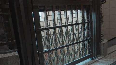 Broken old vintage elevator cabin stuck between floors. Forces to take the Stock Footage 161256388