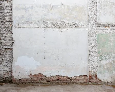 Broken old white plaster brick wall Stock Photos
