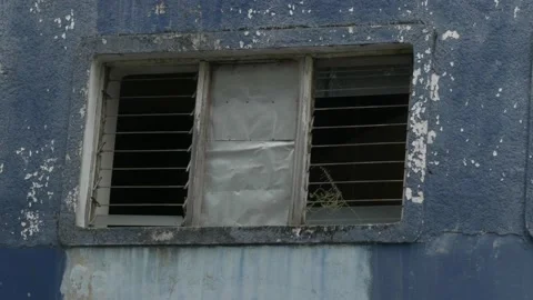 Broken old windows of abandoned building near Sudi Mampir market Stock Footage 156997054