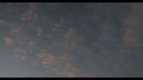 Broken orange clouds during evening, 24fps, 709 colour profile, 4k Stock Footage 277226974