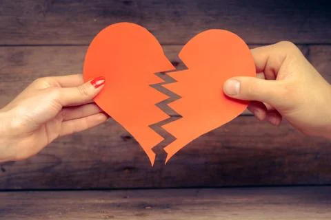 Broken paper heart Stock Photos