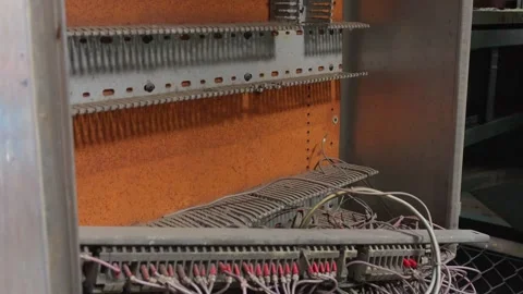 Broken patch cables in old abandoned factory Stock Footage 305513145