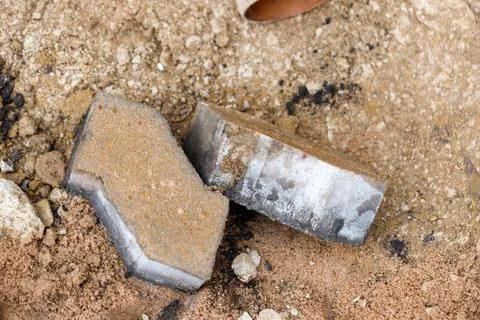 Broken Paving Slabs on Sand Stock Photos