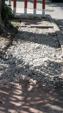 Broken pedestrian road under construction Stock Photos