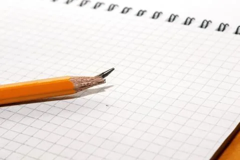 Broken pencil and notebook Stock Photos