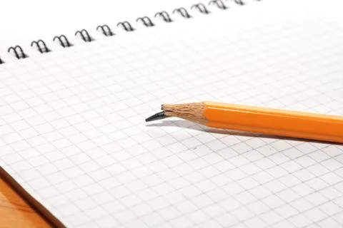 Broken pencil and notebook Stock Photos