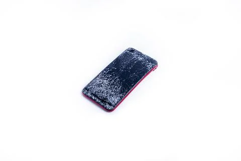 Broken phone on a white background, broken electronics Stock Photos