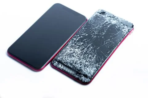 Broken phone on a white background, broken electronics Stock Photos