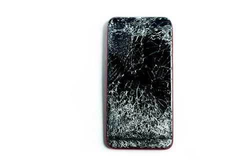 Broken phone on a white background, broken electronics Stock Photos