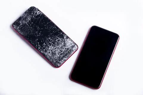 Broken phone on a white background, broken electronics Stock Photos