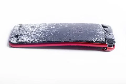Broken phone on a white background, broken electronics Stock Photos