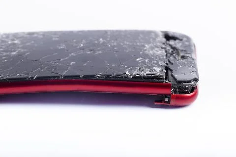 Broken phone on a white background, broken electronics Stock Photos