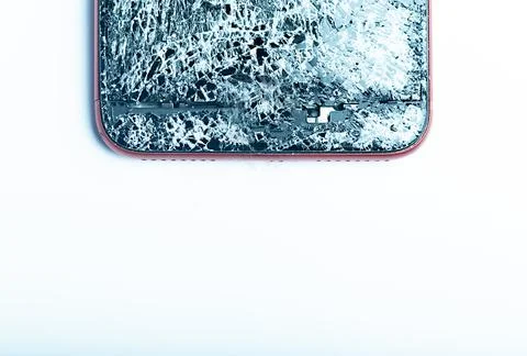 Broken phone on a white background, broken electronics Stock Photos