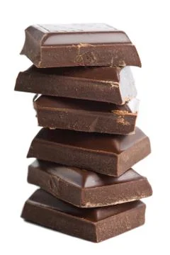 Broken pieces of chocolate isolated Stock Photos