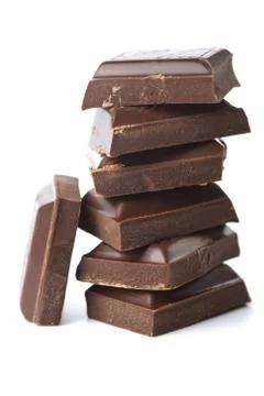 Broken pieces of chocolate isolated Stock Photos