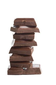 Broken pieces of chocolate isolated Stock Photos