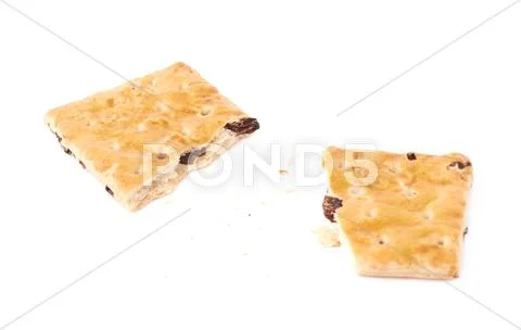 Broken into pieces cookie isolated over the white background Stock Photos