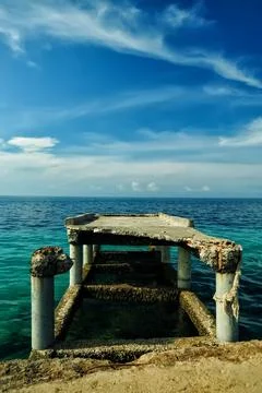 Broken pier of the harbor Stock-Fotos