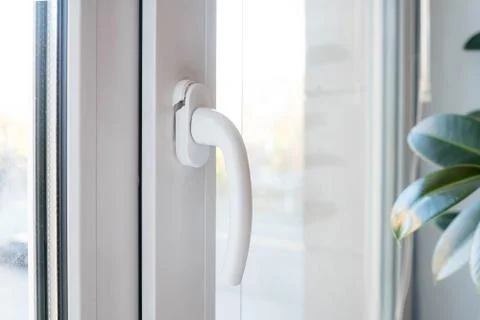Broken plastic window handle. Crack in the structure Stock Photos